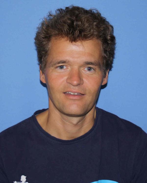 Portrettfoto av Lars Rune Waage litteraturviter og leder for Institutt for grunnskolelærerutdanning, idrett og spesialpedagogikk ved Universitetet i Stavanger